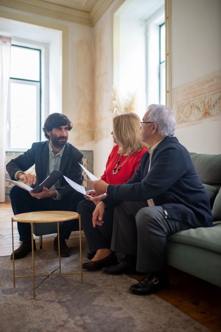 Couple in a private consultation with a specialist in Lisbon